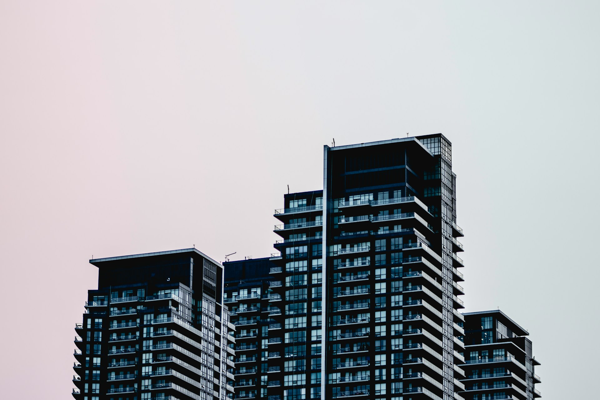 Modern residential towers against overcast sky